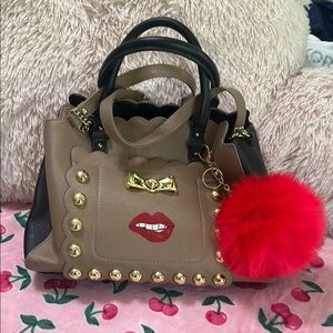 Besty Johnson Stylish Tan and Black Handbag with Gold Accents